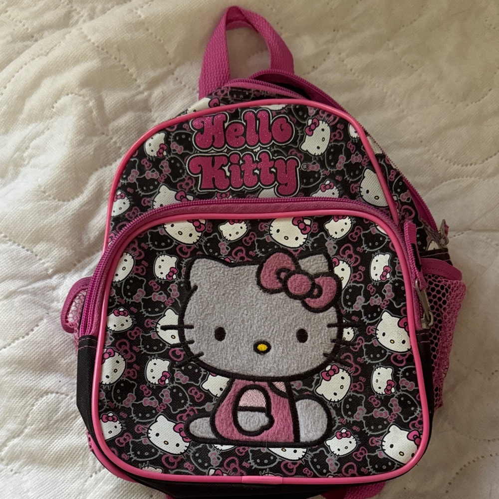 Sanrio Hello Kitty Pink and Black Mini Backpack for kids or adults who.